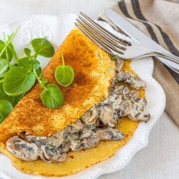 Chickpea flour crepes with a creamy mushroom filling