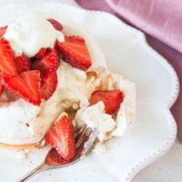 Meringue nests with Champagne Poached Strawberries