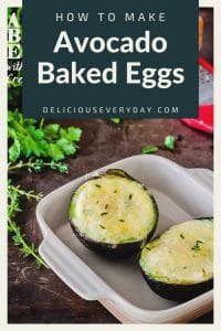 Avocado baked eggs with creme fraiche and herbs