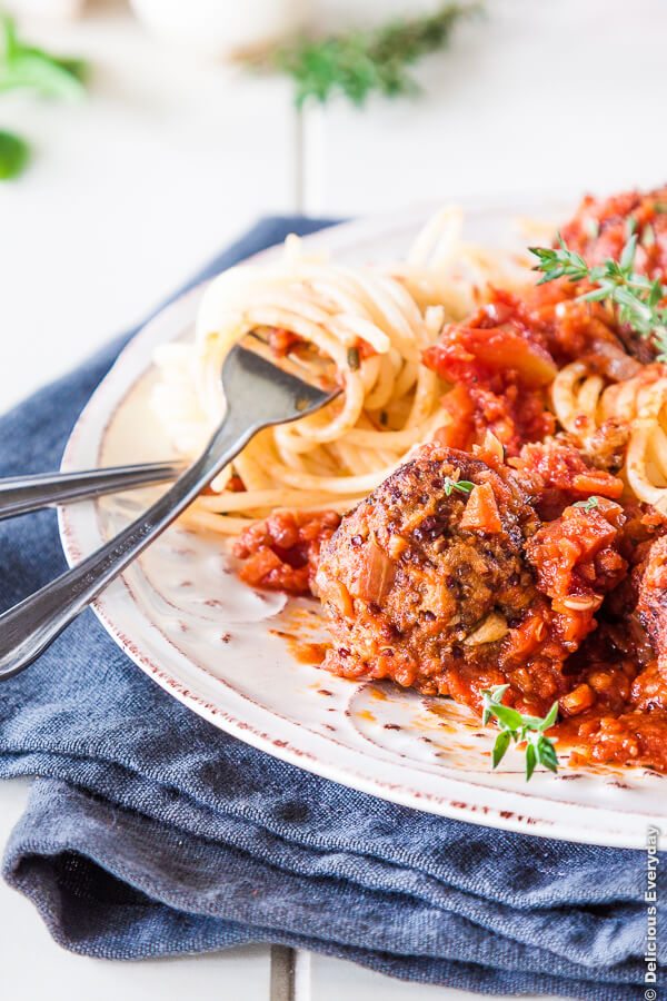 Spaghetti and Meatballs gets a vegetarian make over with plump delicious mushroom and quinoa vegetarian meatballs in a rich tomato sauce | Click for the recipe