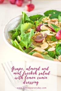 Grape almond and mint freekeh salad with lemon cumin dressing vegan