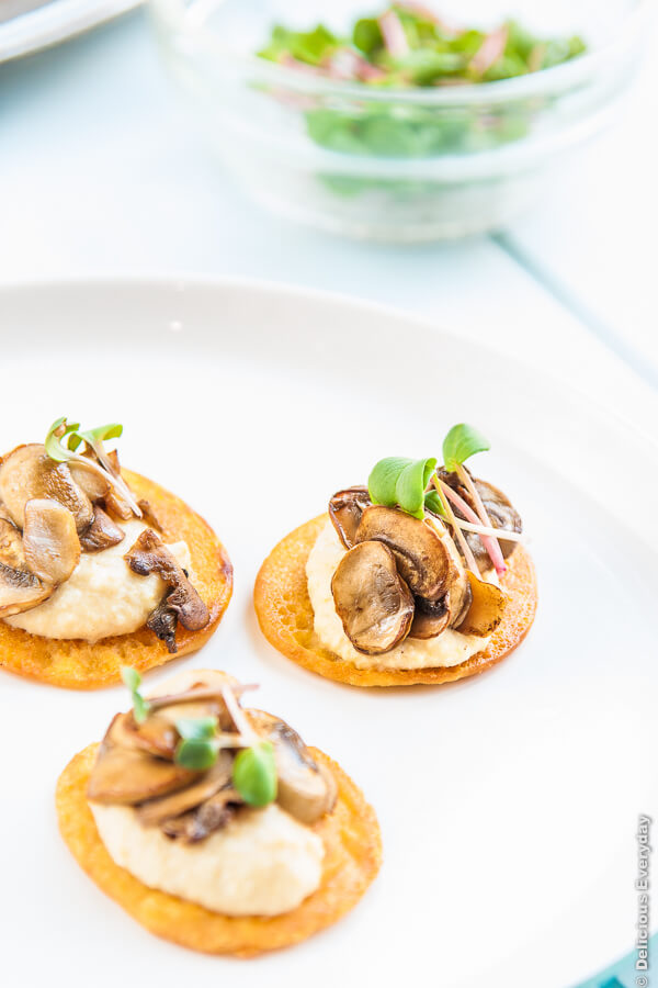 Chickpea Blini with Hummus and Mushrooms - these baby socca are vegan and gluten free and perfect for your next party!| deliciouseveryday.com