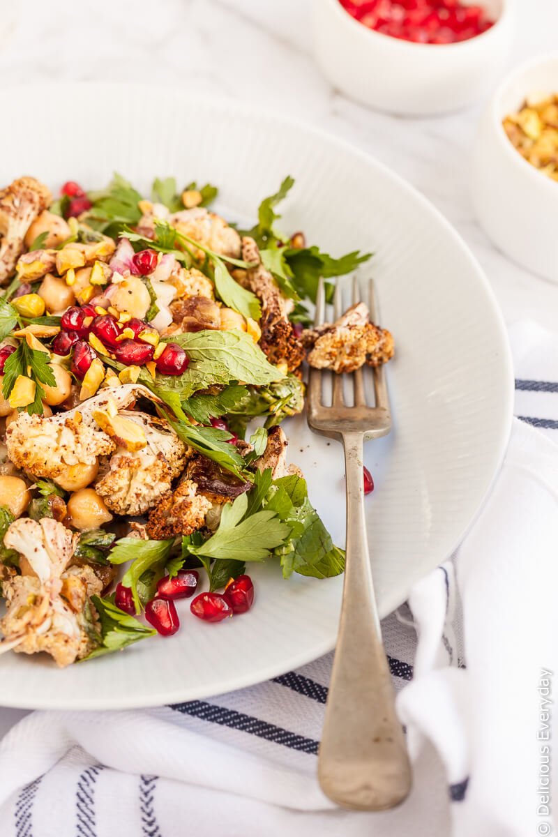 Think you don't like cauliflower? Think again! This Sumac Roasted Cauliflower Salad takes cauliflower to a whole new level. Paired with Medjool dates, pomegranate and mint and parsley this beautiful salad is an explosion of flavours and textures. 