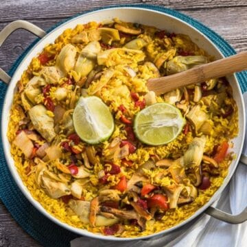 Spanish rice is simmered in vegetable stock and wine, then combined with saffron, spanish spices, and delicious veggies.