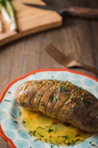 Slow Cooker Hasselback Potatoes with Honey-Sriracha Butter