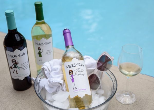 wine bottles on ice by the pool