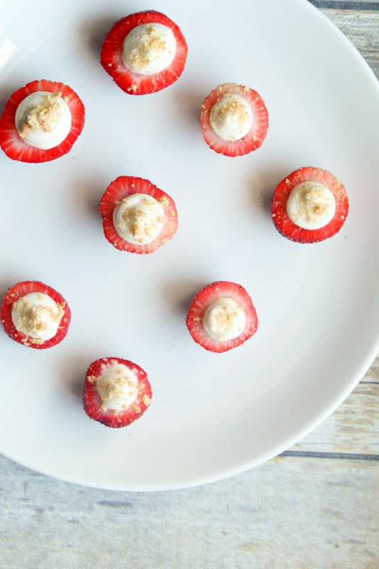no bake strawberry cheesecake bites on a serving dish