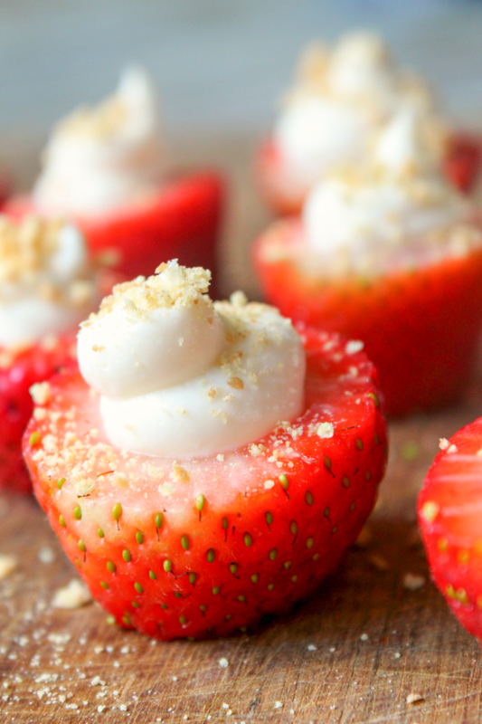 no bake strawberry cheesecake bites on a serving board