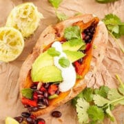 Loaded Sweet Potato With Spicy Black Beans and Cashew-Lime Cream