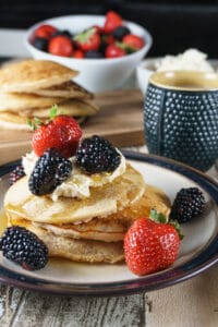 chai spiced pancakes with pancake stack and strawberries