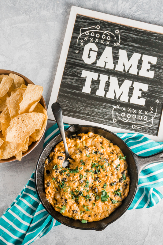 chili cheese dip with a game time sign