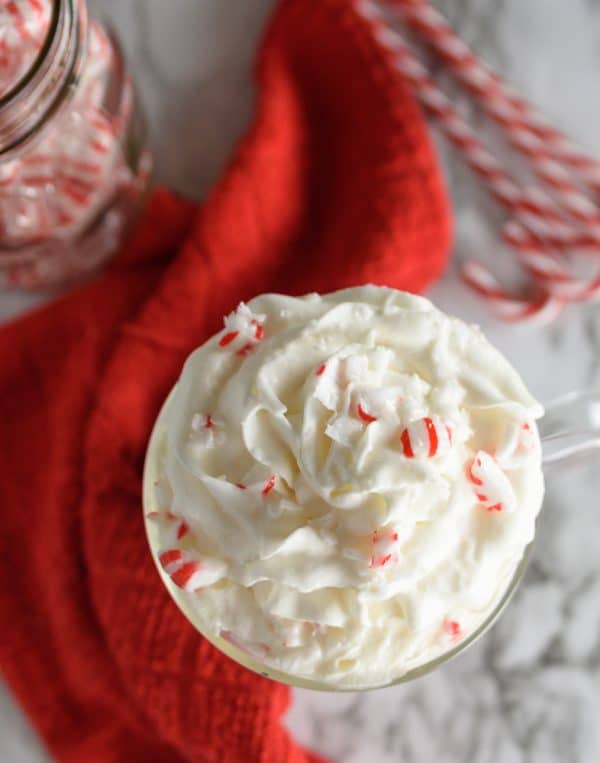 topping the vegan chocolatte with peppermint candies