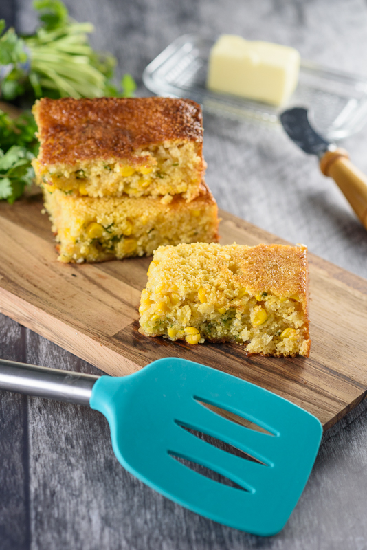 spicy cornbread being served on a cutting board