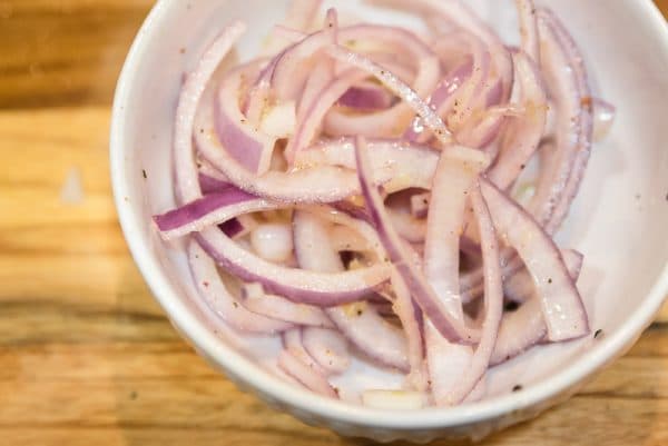 onions marinating in a small bowl