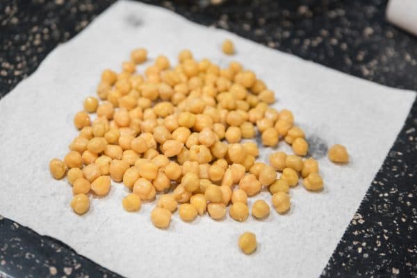 drying chickpeas on a paper towel after rinsing