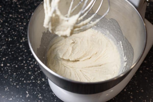 vegan cream cheese frosting being whisked in the mixer