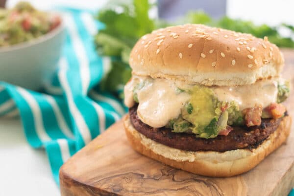 veggie burger topped with homemade guacamole and chipotle ranch dressing