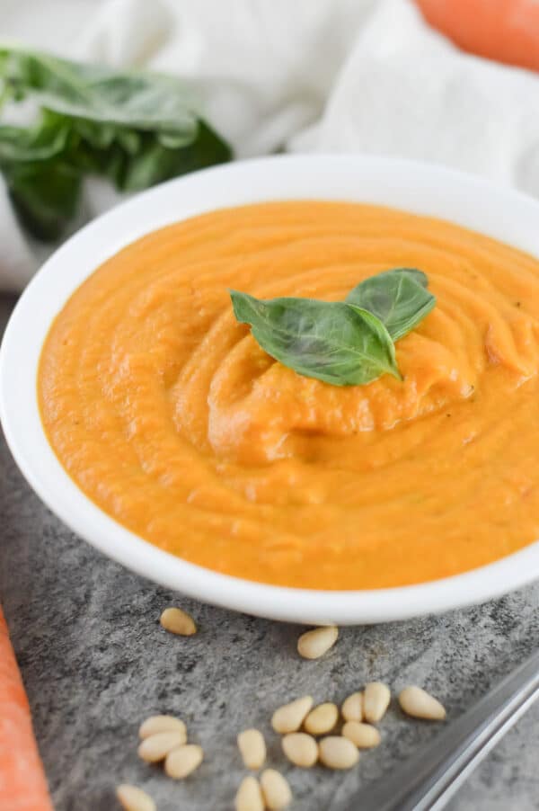 vegan carrot soup being served