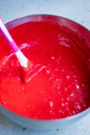 red batter being mixed