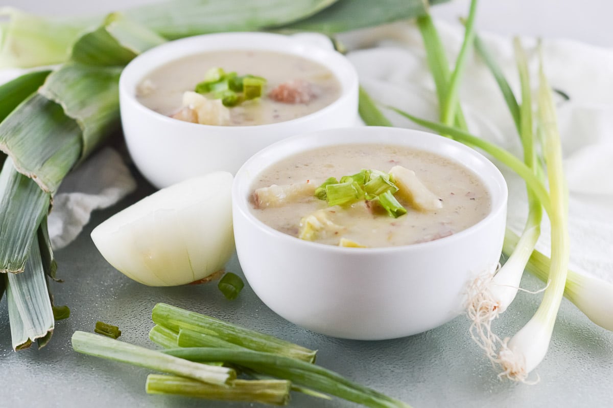two bowls of vegan potato leek soup