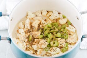 vegan cauliflower soup ingredients in a pot