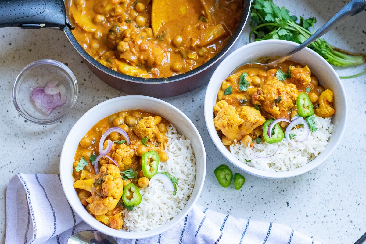two bowls of vegan chickpea curry