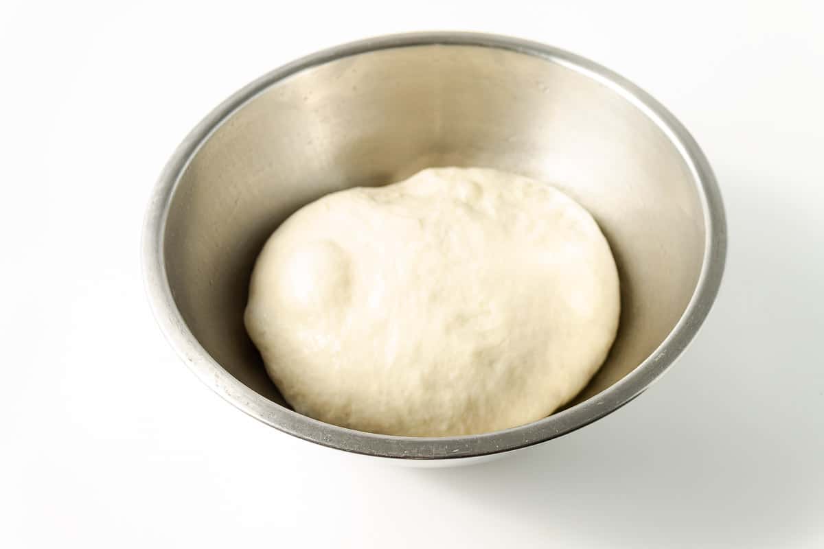 ball of Vegan Pizza dough in bowl