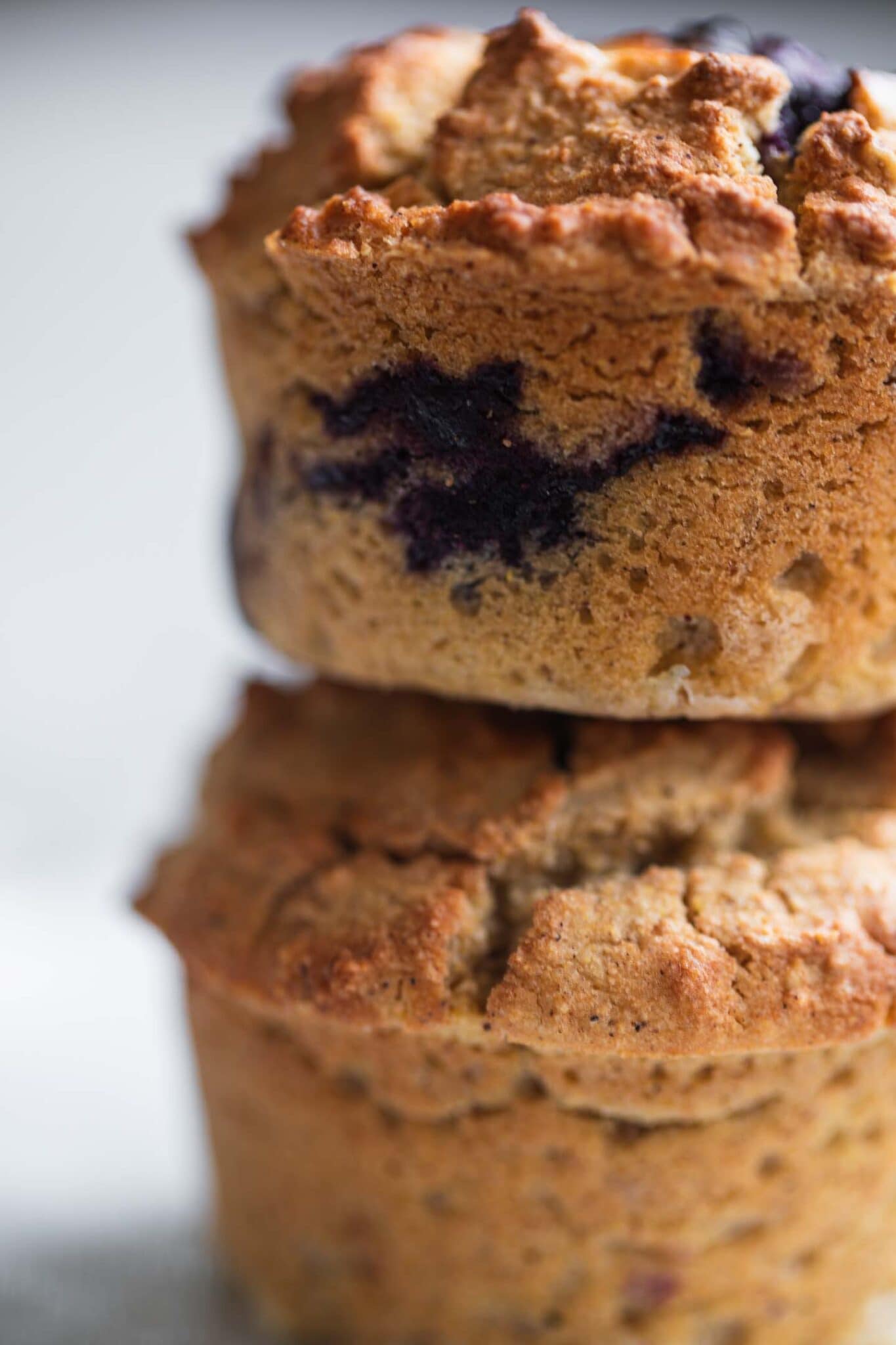 vegan blueberry muffins piled high