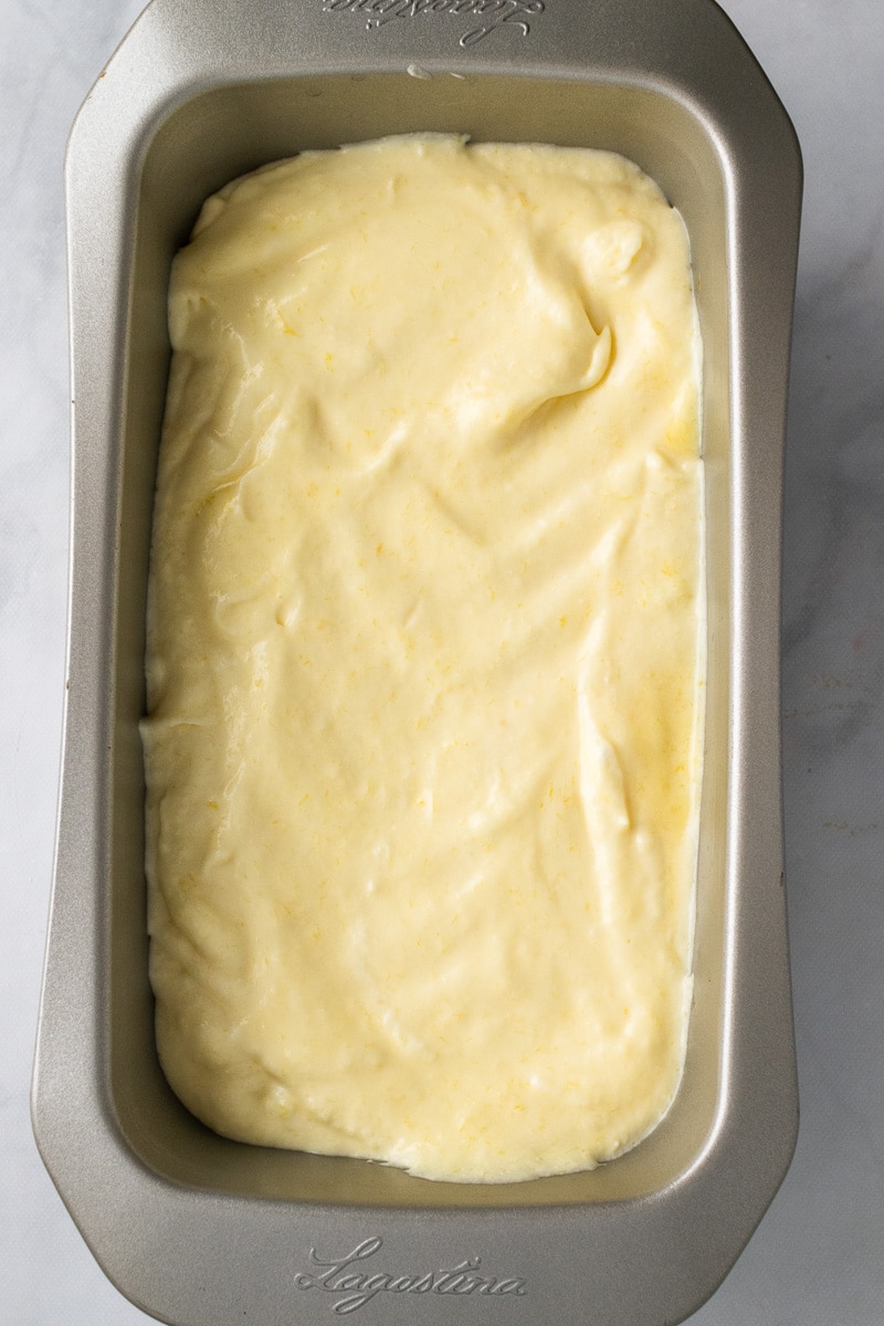 loaf pan full of homemade mango ice cream