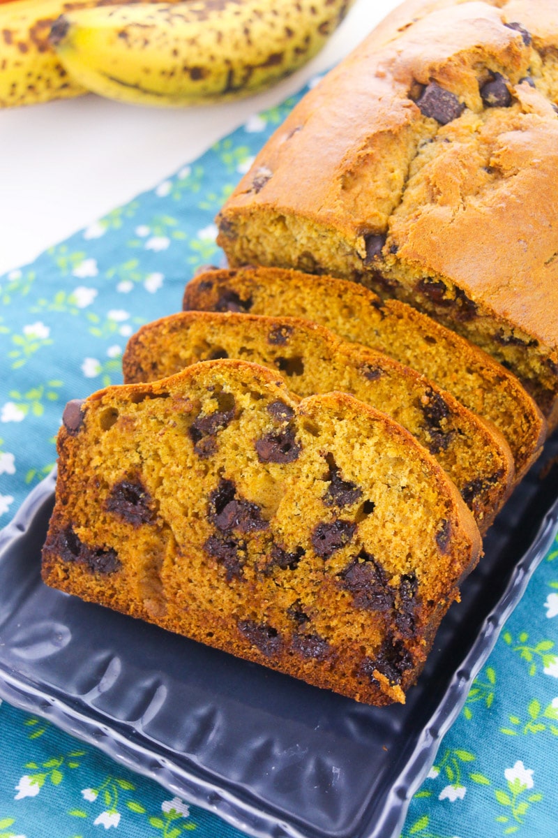 top view of sliced loaf of pumpkin banana bread with chocolate chips