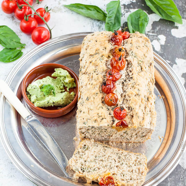Super Easy Beer Bread with Basil and Tomatoes - All you need is a handful of ingredients, and an hour, and to make this super easy beer bread with basil and tomato. Serve warm slathered with butter! | Get the recipe at deliciouseveryday.com