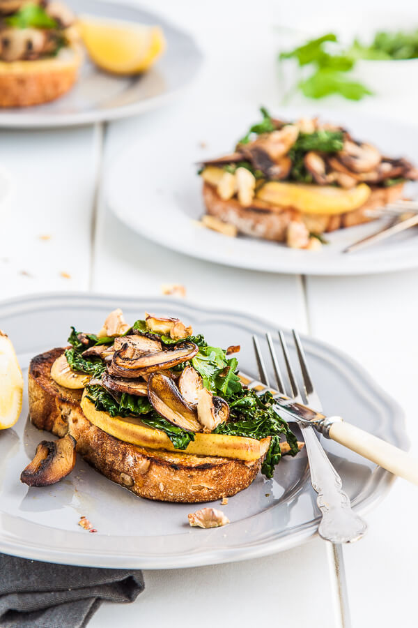 Mushroom Pear and Cavolo Nero Toasts - These scrumptious brunch toasts are topped with earthy mushrooms and slightly bitter cavolo nero which contrast beautifully with sweet pear and leeks. The finishing touch is a sprinkling of toasted walnuts. | DeliciousEveryday.com