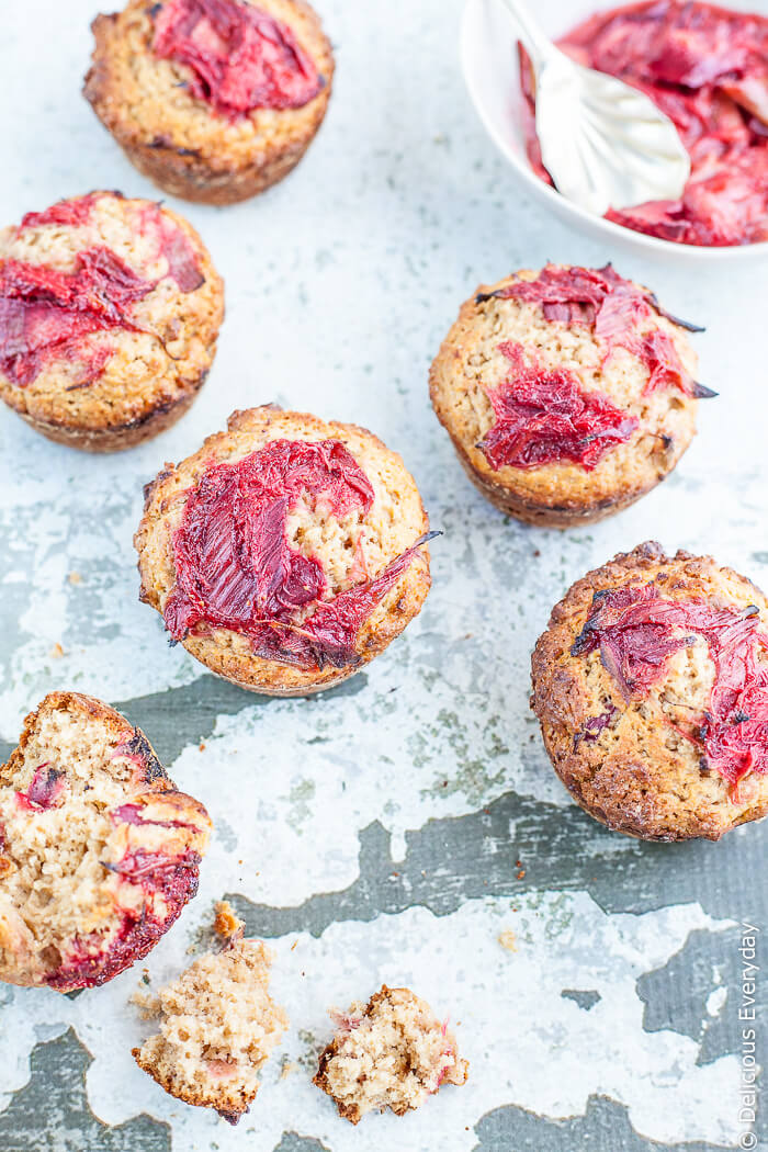 Rhubarb and Strawberry Whole Wheat Muffins - delicious roasted strawberries and rhubarb come together with whole wheat spelt flour and a rhubarb and strawberry compote for a decadent weekend breakfast. Freshly baked muffins for breakfast. Yes please! 