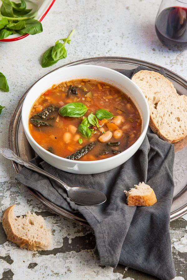 Tuscan Bean Soup Recipe - this hearty Tuscan bean soup is so warming and nourishing. It’s sure to cure whatever ails you! | Get the recipe at DeliciousEveryday.com