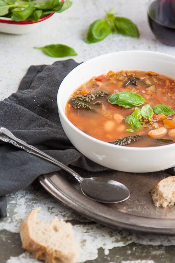 Tuscan Bean Soup Recipe - this hearty Tuscan bean soup is so warming and nourishing. It’s sure to cure whatever ails you! | Get the recipe at DeliciousEveryday.com
