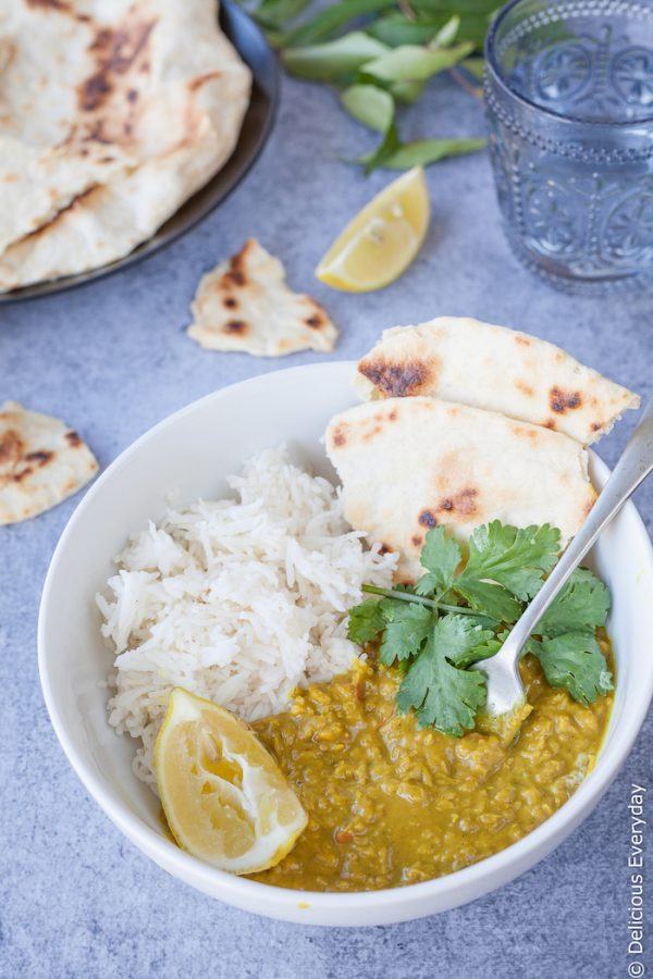 Vegan Red lentil dal - served with steaming rice and naan bread this vegan dahl is the ultimate in comfort food | DeliciousEveryday.com